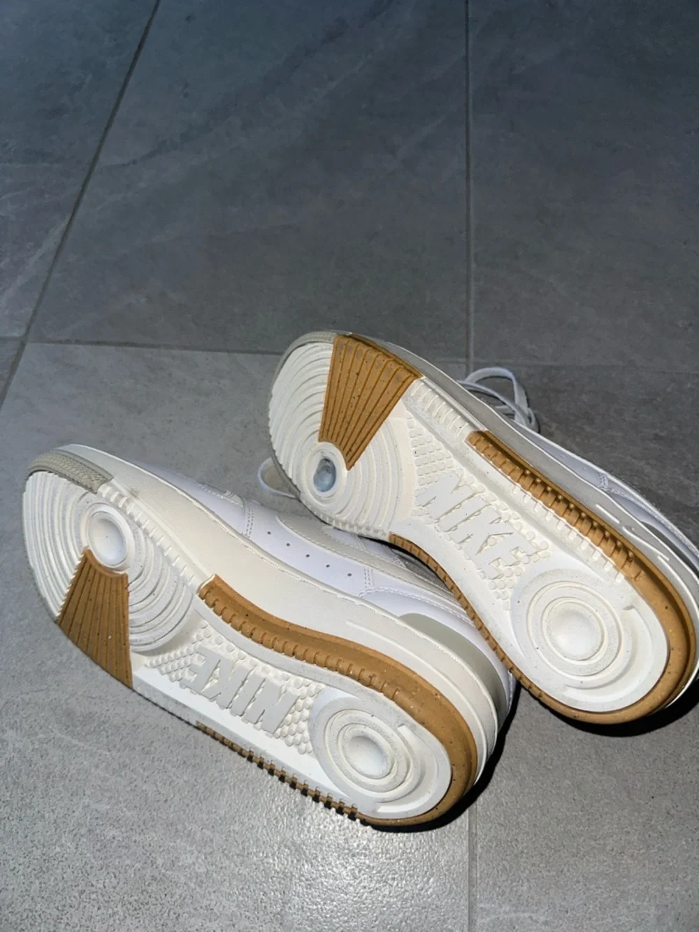 Nike White Sneakers with Cream Swoosh and Gum Outsole
